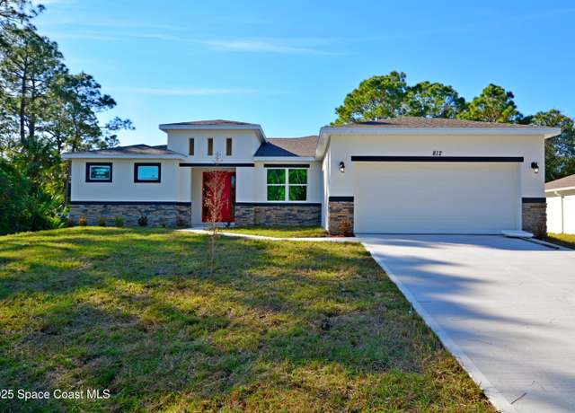 Property at 812 Natroma Ave SW, Palm Bay, FL 32908, 4 beds, 2.5 baths