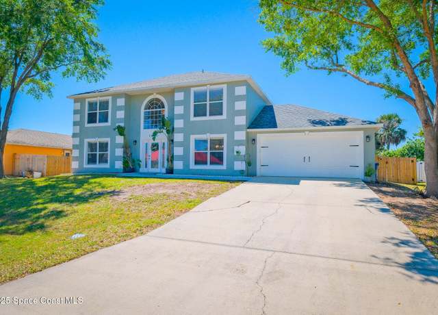 Property at 1620 Carbondale Ave NW, Palm Bay, FL 32907, 4 beds, 2.5 baths