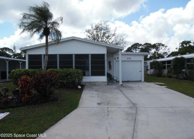 Property at 809 Tamarind Dr, Barefoot Bay, FL 32976, 2 beds, 2 baths