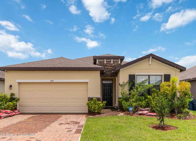 Property at 947 Remington Green Dr SE, Palm Bay, FL 32909, 4 beds, 2 baths
