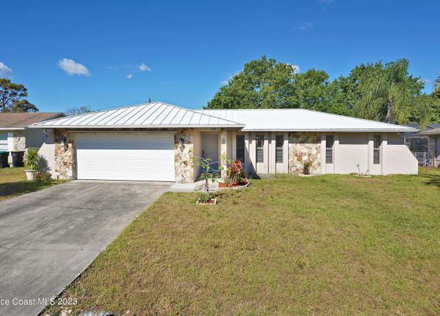 Property at 418 Candlestick Ave NE, Palm Bay, FL 32907, 3 beds, 2 baths
