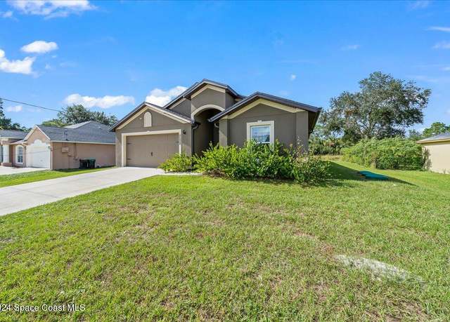 Property at 2528 Fleming Ave SW, Palm Bay, FL 32908, 4 beds, 2 baths