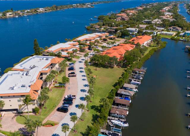 Property at 27 Marina Isles Blvd, Indian Harbour Beach, FL 32937, 3 beds, 2.5 baths