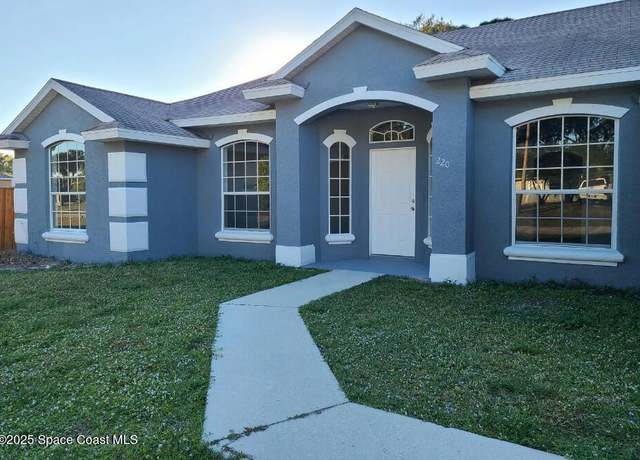 Property at 220 Medea Ave NW, Palm Bay, FL 32907, 4 beds, 3 baths