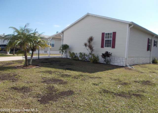 Property at 801 W Lychee Dr, Barefoot Bay, FL 32976, 3 beds, 2 baths