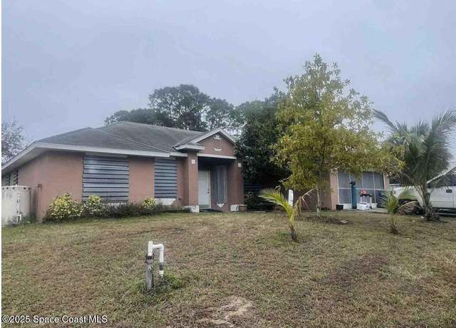 Property at 513 Plumbago Rd NW, Palm Bay, FL 32907, 3 beds, 3 baths