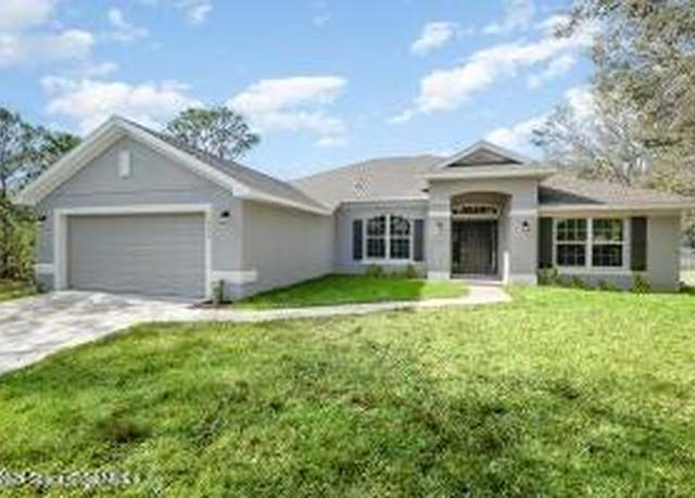 Property at 700 De Groodt Rd SW, Palm Bay, FL 32908, 4 beds, 3 baths