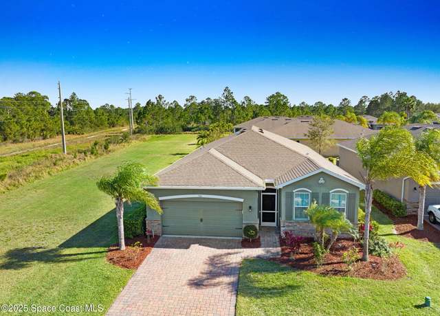 Property at 744 Remington Green Dr SE, Palm Bay, FL 32909, 4 beds, 2 baths