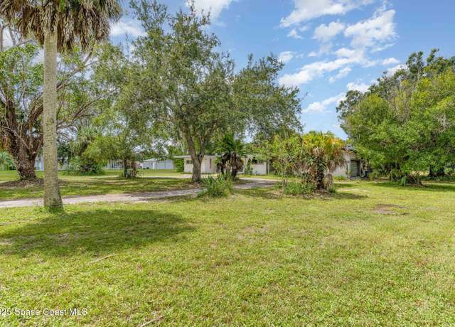 Property at 1048 Knecht Rd NE, Palm Bay, FL 32905, 4 beds, 3 baths