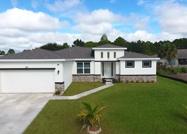 Property at 241 Saint Andre Blvd SW, Palm Bay, FL 32908, 4 beds, 2.5 baths