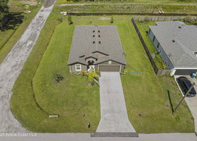 Property at 2498 Fleming Ave SW, Palm Bay, FL 32908, 4 beds, 2 baths