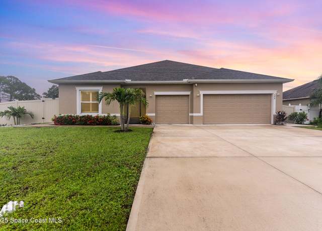 Property at 399 Calcutta Ave NW, Palm Bay, FL 32907, 4 beds, 3 baths