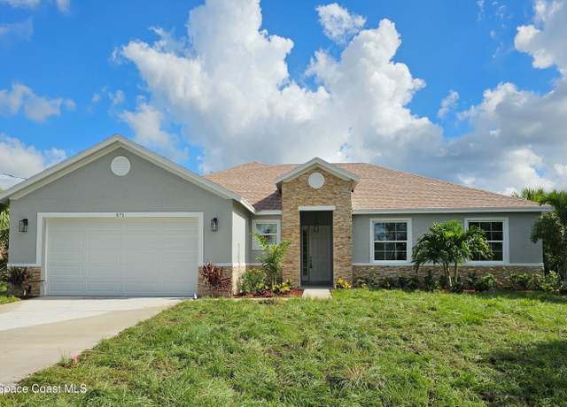 Property at 571 Fondulac St, Palm Bay, FL 32908, 4 beds, 2 baths