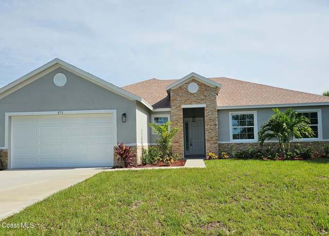 Property at 571 Fondulac St, Palm Bay, FL 32908, 4 beds, 2 baths