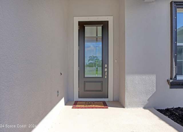 Property at 1752 Killian Dr NE, Palm Bay, FL 32905, 4 beds, 3 baths