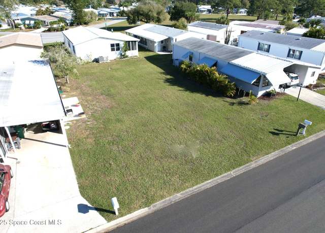 Property at 316 Papaya Cir, Barefoot Bay, FL 32976