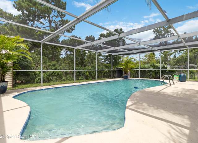 Property at 4910 Key Largo Dr W, Titusville, FL 32780, 4 beds, 2 baths