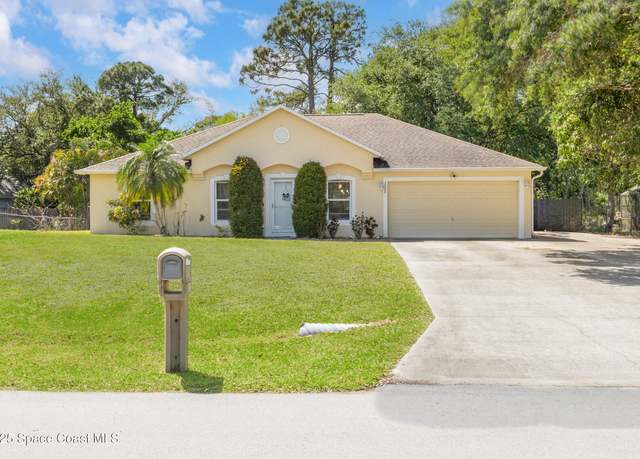 Property at 1322 Stadt Rd NW, Palm Bay, FL 32907, 4 beds, 2 baths