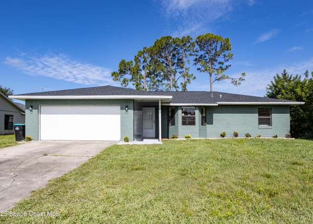 Property at 1020 Lee Ave NW, Palm Bay, FL 32907, 4 beds, 2 baths