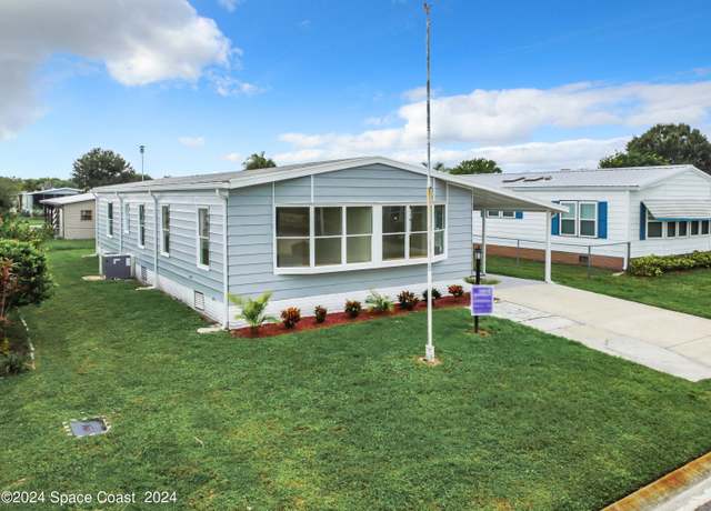 Property at 911 Hyacinth Cir, Barefoot Bay, FL 32976, 2 beds, 2 baths