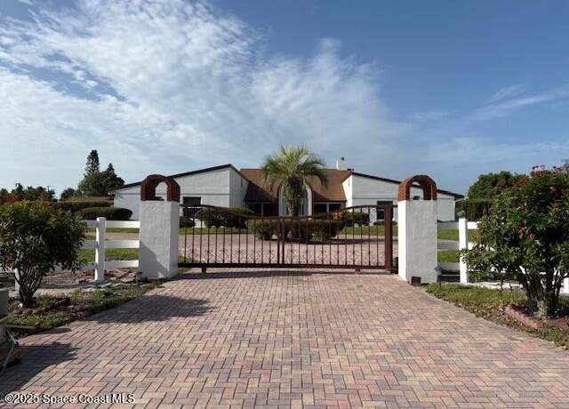 Property at 1815 Villa Espana Trl, Melbourne, FL 32935, 5 beds, 6.5 baths