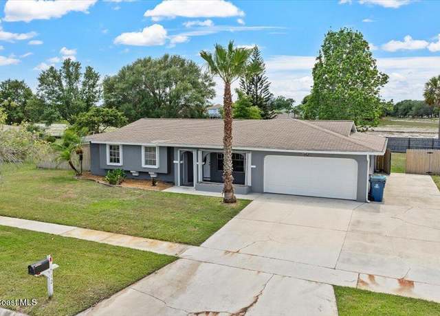 Property at 712 Port Malabar Blvd NE, Palm Bay, FL 32905, 3 beds, 2 baths