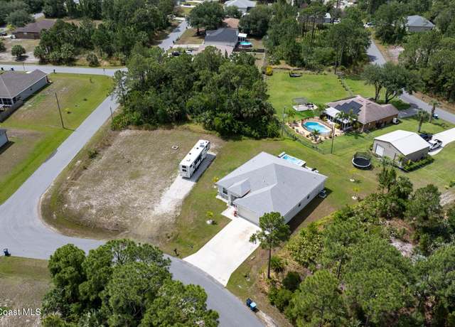 Property at 410 Flagler Rd SE, Palm Bay, FL 32909, 4 beds, 3 baths