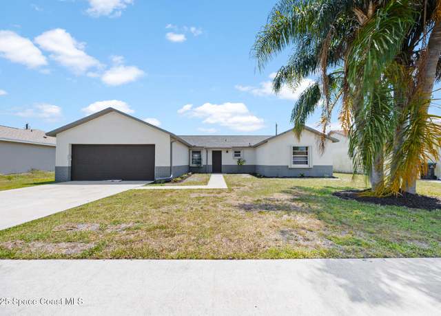 Property at 1239 Van Tassell Trl NE, Palm Bay, FL 32905, 3 beds, 2 baths