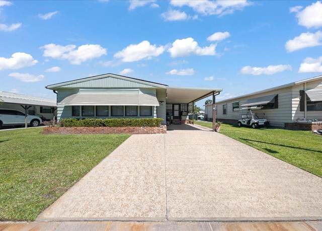 Property at 1919 Mango St NE, Palm Bay, FL 32905, 2 beds, 2 baths
