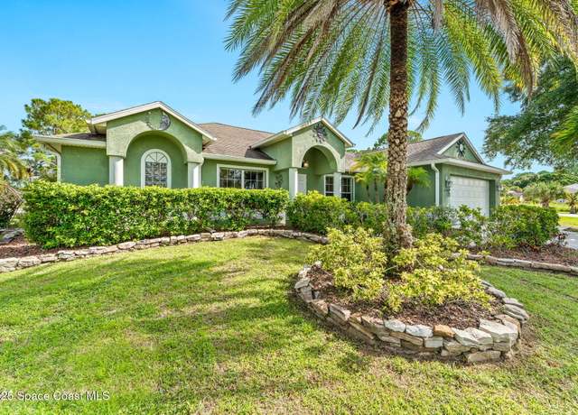 Property at 899 Sanford St SW, Palm Bay, FL 32908, 3 beds, 2 baths