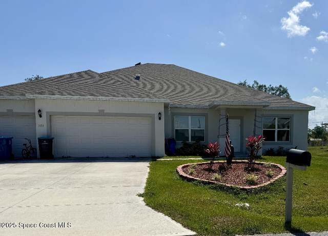 Property at 1430 Denali St SE, Palm Bay, FL 32909, 4 beds, 3 baths