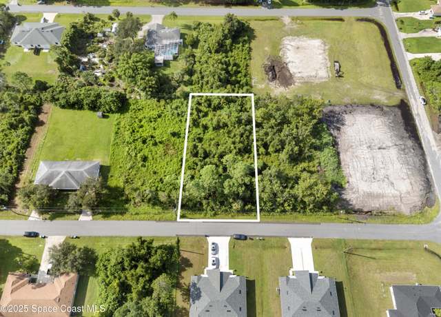 Property at 1626 Chamorro St SE, Palm Bay, FL 32909