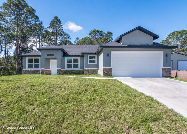 Property at 1398 Saxony Rd SW, Palm Bay, FL 32908, 4 beds, 3 baths