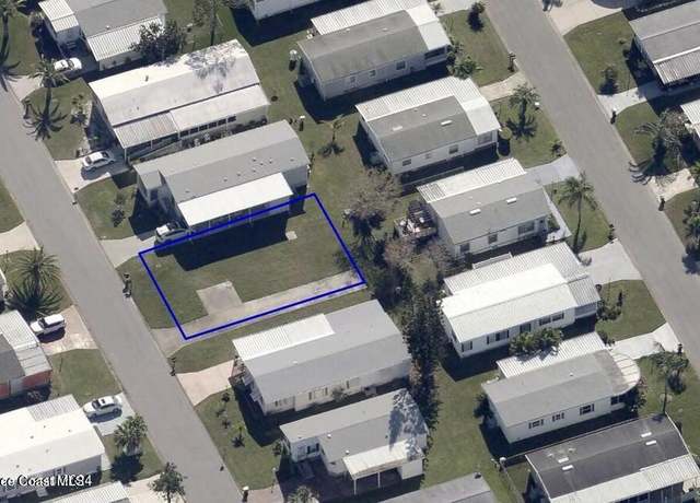 Property at 637 Hyacinth Cir, Barefoot Bay, FL 32976
