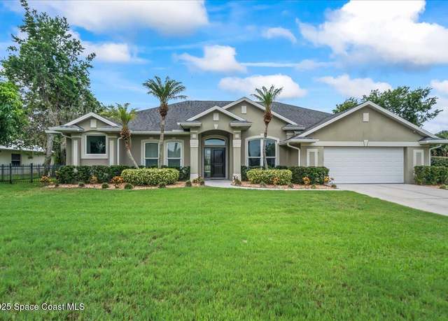 Property at 1065 Mercedes Dr, Merritt Island, FL 32952, 4 beds, 3 baths