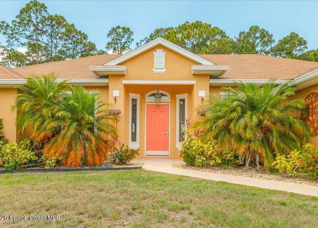 Property at 1550 Holcomb St St NW, Palm Bay, FL 32907, 4 beds, 3 baths