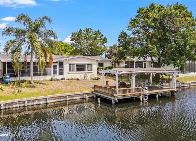 Property at 945 E Richland Ave, Merritt Island, FL 32953, 4 beds, 2 baths