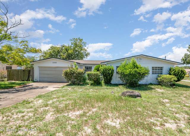 Property at 1080 N Carpenter Rd, Titusville, FL 32796, 4 beds, 2 baths