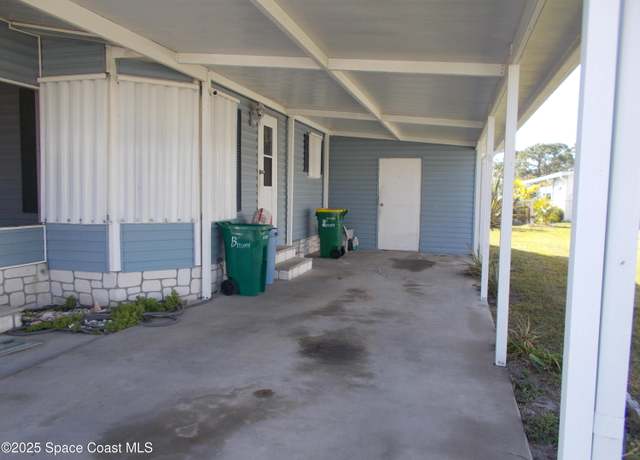 Property at 821 SW Lychdee Dr, Barefoot Bay, FL 32976, 2 beds, 2 baths