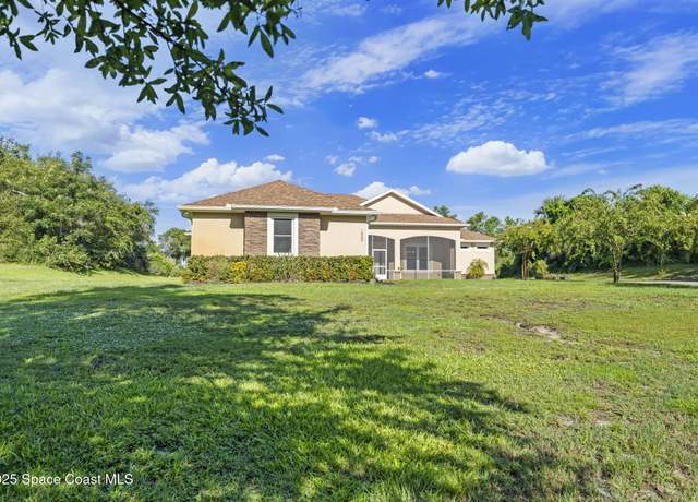 Property at 1560 Silk Oak Ave, Titusville, FL 32796, 4 beds, 3 baths