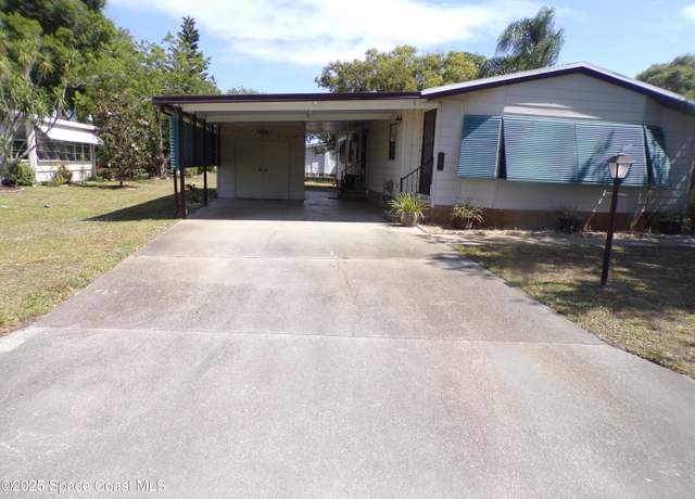 Property at 922 Yew St, Barefoot Bay, FL 32976, 2 beds, 2 baths