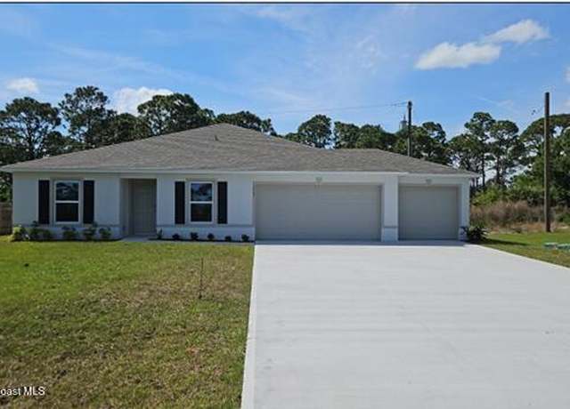 Property at 1902 Trapper Ave SE, Palm Bay, FL 32909, 4 beds, 2 baths