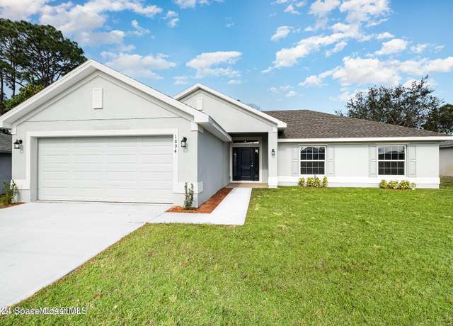 Property at 930 San Filippo Dr SE, Palm Bay, FL 32909, 4 beds, 2 baths