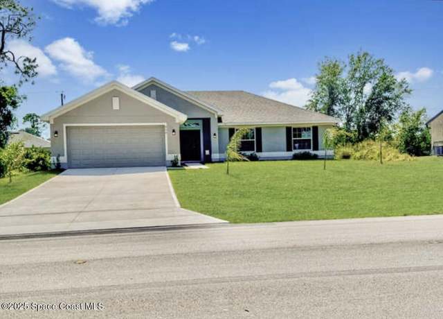 Property at 930 San Filippo Dr SE, Palm Bay, FL 32909, 4 beds, 2 baths