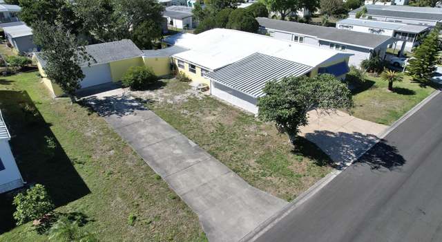 Photo of 410 Egret Cir, Barefoot Bay, FL 32976