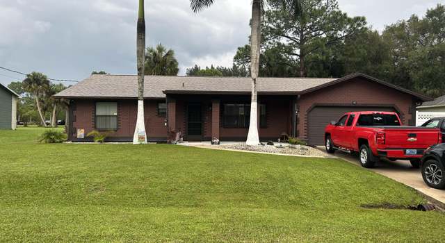 Photo of 141 Greenbrier Ave NW, Palm Bay, FL 32907