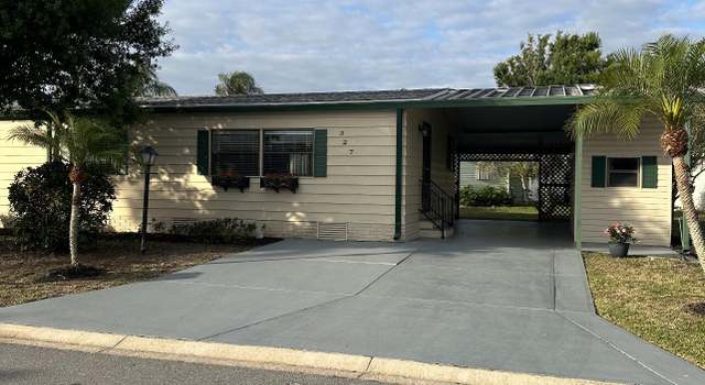 Photo of 327 Macadamia Dr, Barefoot Bay, FL 32976