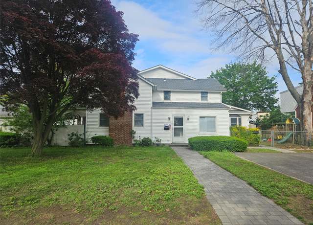 Property at 180 Donahue Ave, Inwood, NY 11096, 7 beds, 3.5 baths