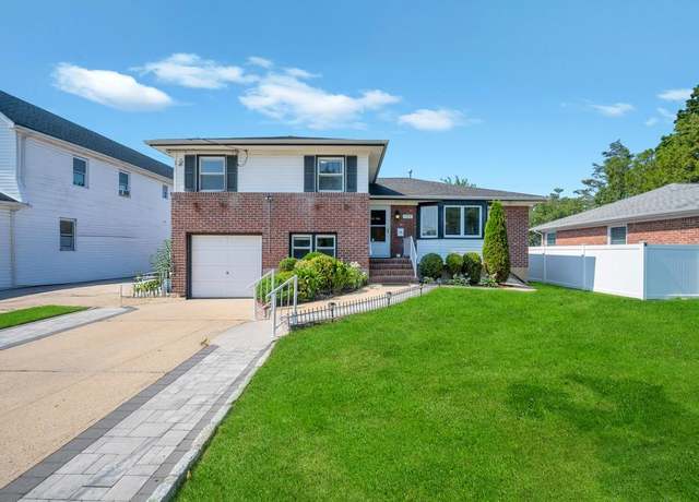 Property at 129 8th St, Hicksville, NY 11801, 4 beds, 3 baths