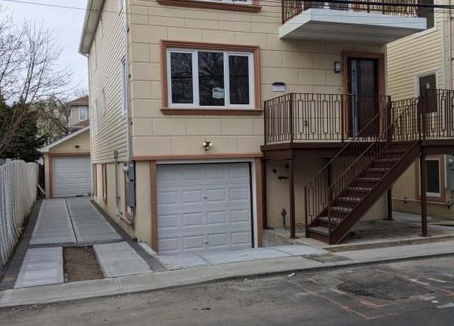 Property at 102-31 164th Ave, Howard Beach, NY 11414, 4 beds, 2 baths